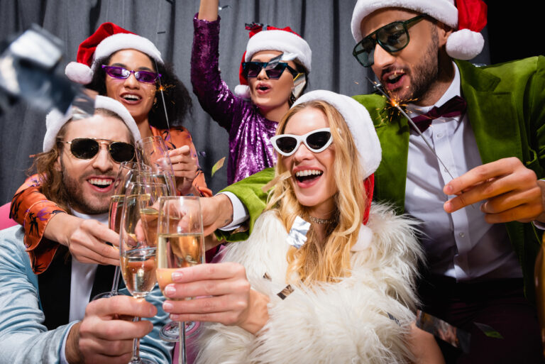 Friends toasting at a holiday party in Denver